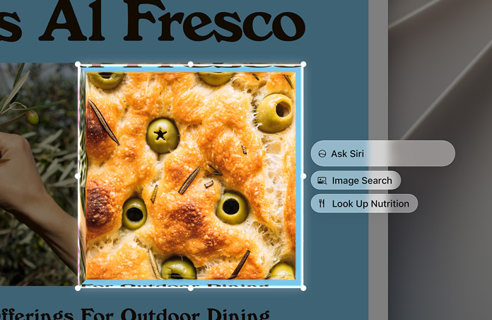 Vpravo od zvýrazněného obrázku oliv zapečených ve focaccie se zobrazí pole Visual Intelligence, Ask Siri, Image Search a Nutritional Value