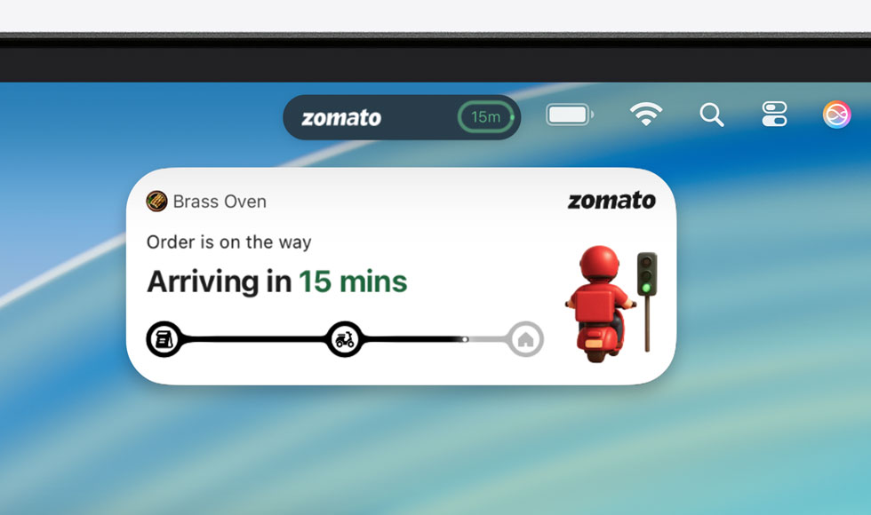 Top of Mac device screen showing the menu bar with an expanded Live Activity for Uber Eats