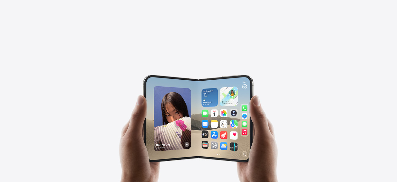 iPhone Duo, held by two hands in landscape orientation, unfolded, interior display features Home Screen