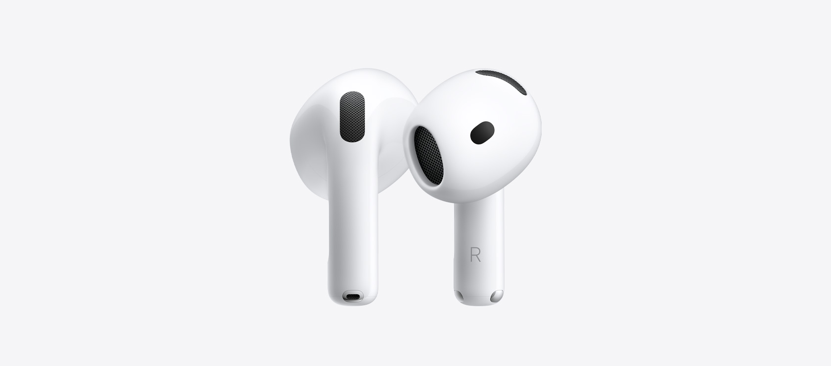 AirPods 5: langattomat soikeat kuulokkeet, valkoinen väri, kuulokeosa, jonka sisällä on kaiuttimen verkko, lyhyt varsi, jossa hopeanvärinen latausliitin, vasemman ja oikean puolen kirjainmerkit
