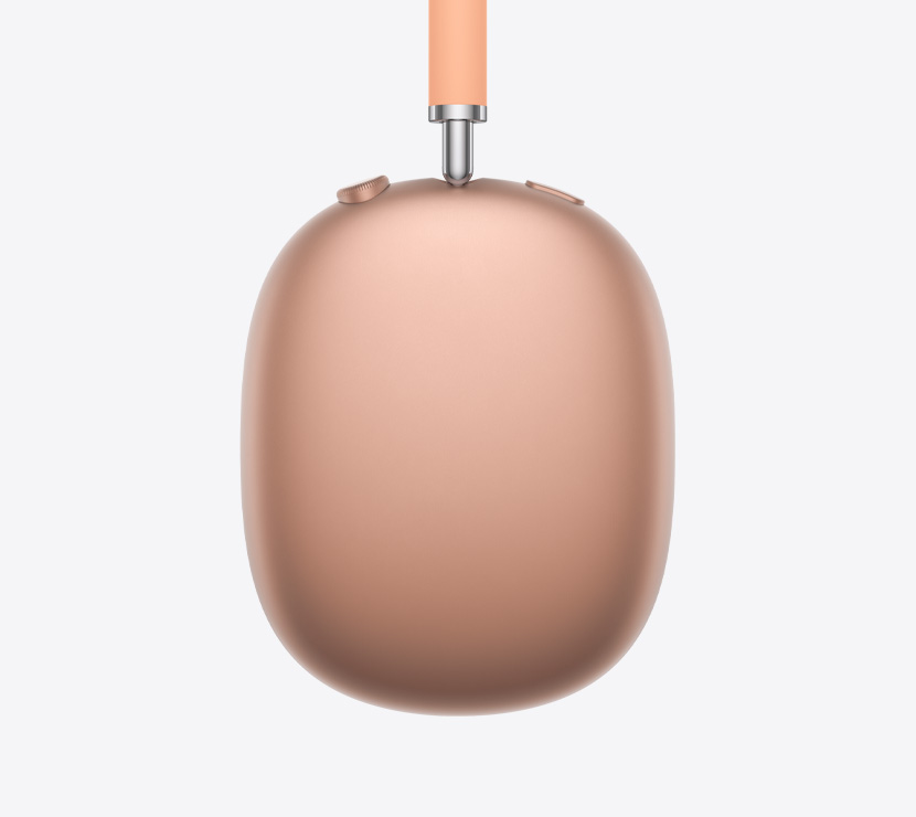 Ausinės „AirPods Max 2“, šoninė išorinė pusė, oranžinės spalvos, teleskopinės rankenėlės detalė, pagalvėlė, „Digital Crown“ ir triukšmo valdymo mygtukas