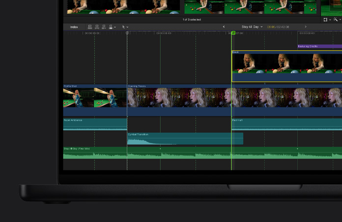 MacBook Pro 16 screen, Final Cut Pro timeline featuring video clips of three different scenes, a woman playing billiards, a woman singing into a microphone