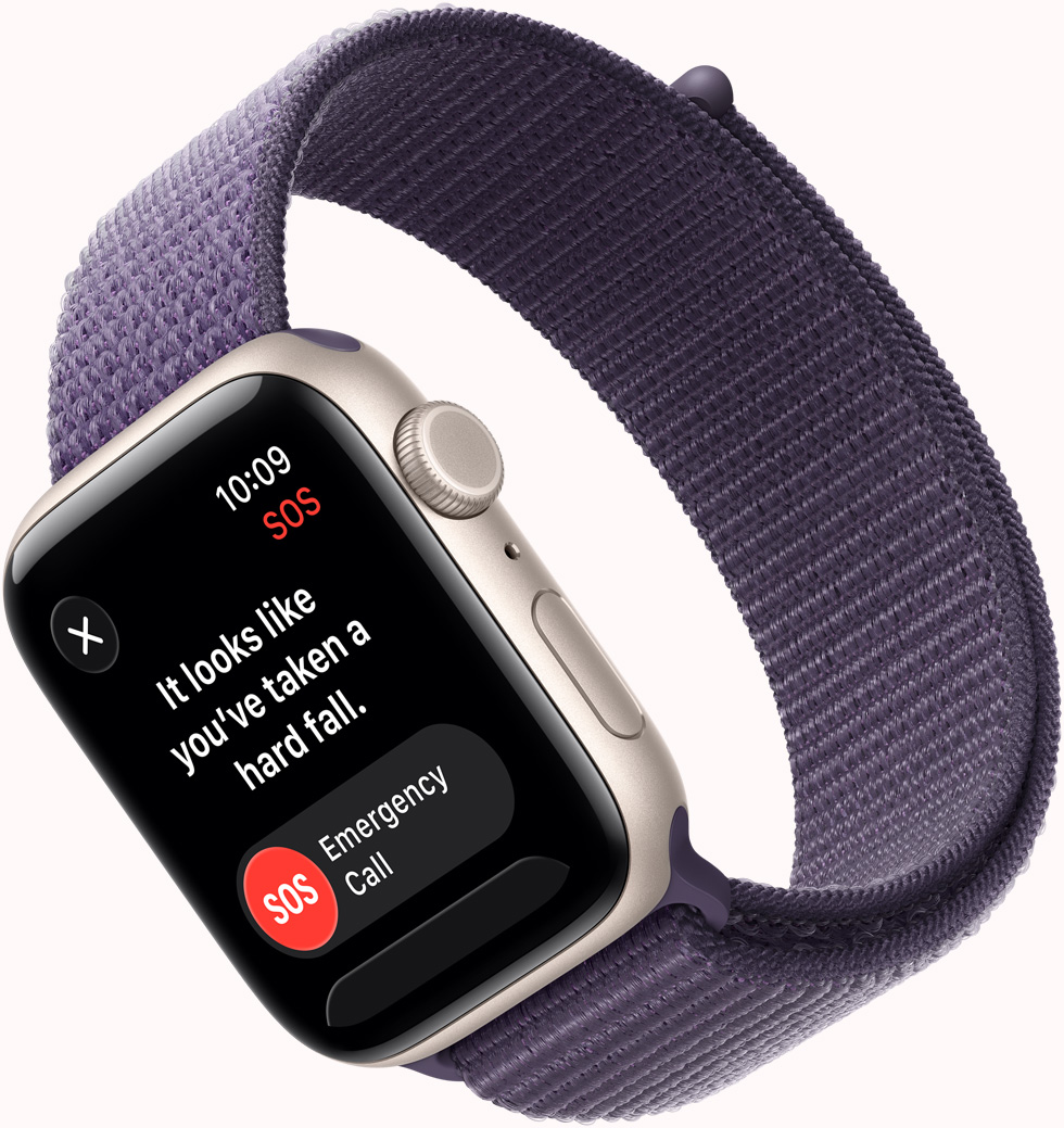 Apple Watch SE 3, корпус з алюмінію, колір «зіркове сяйво», сигнал SOS «Виявлення падіння», кнопки екстреного виклику та «Я OK», правий бік корпусу, коронка Digital Crown, мікрофон, бічна кнопка, ремінець, спортивний браслет, колір «пурпуровий туман»