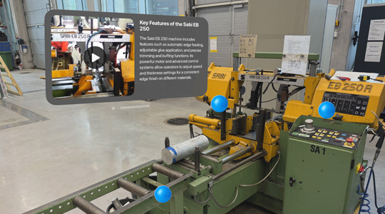A large machine in a warehouse with a 3D projection that reads: Key Features of the Sabi EB 250