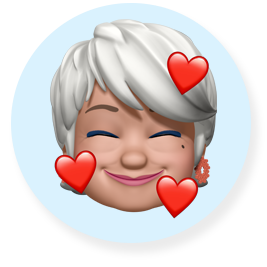 Smilende Memoji-ansigt – en ældre kvinde med kort, hvidt hår