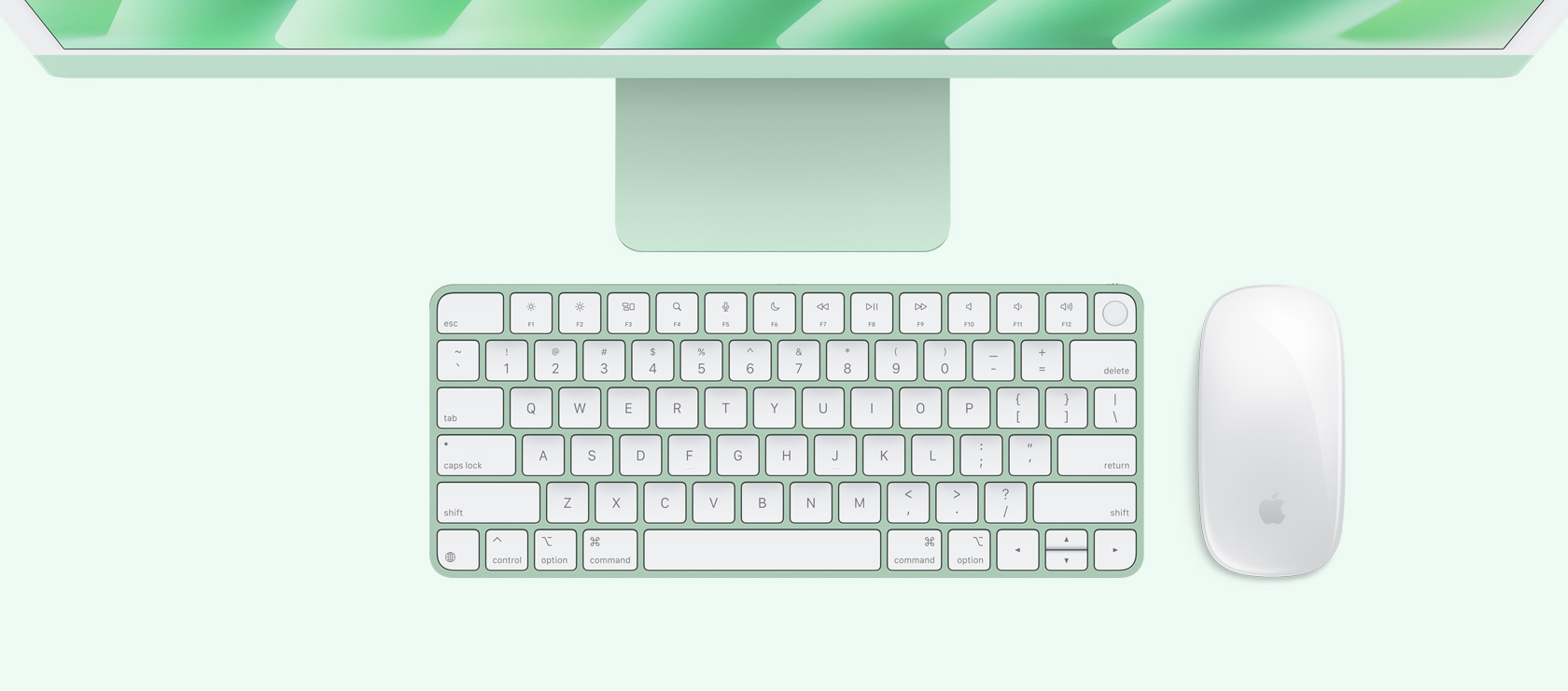 Roheline iMac ülalt alla vaates koos sama värvi hiire ja klaviatuuriga