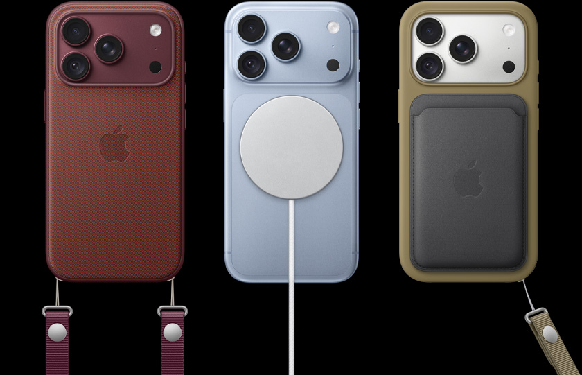 من اليسار إلى اليمين، جهاز iPhone 18 Pro بحافظة جلدية بلون عنّابي مع حزام الكتف بلون عنّابي، جهاز iPhone 18 Pro في الوسط بلون جليدي مع شاحن MagSafe أبيض مثبّت عليه، جهاز iPhone 18 Pro على اليمين بلون فضي مع حافظة هاتف بلون أخضر، محفظة جلدية بلون أسود مع حزام معصم.